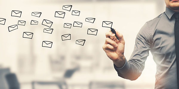 Sending,Email,Concept,-,Businessman,Drawing,Envelopes,In,Office