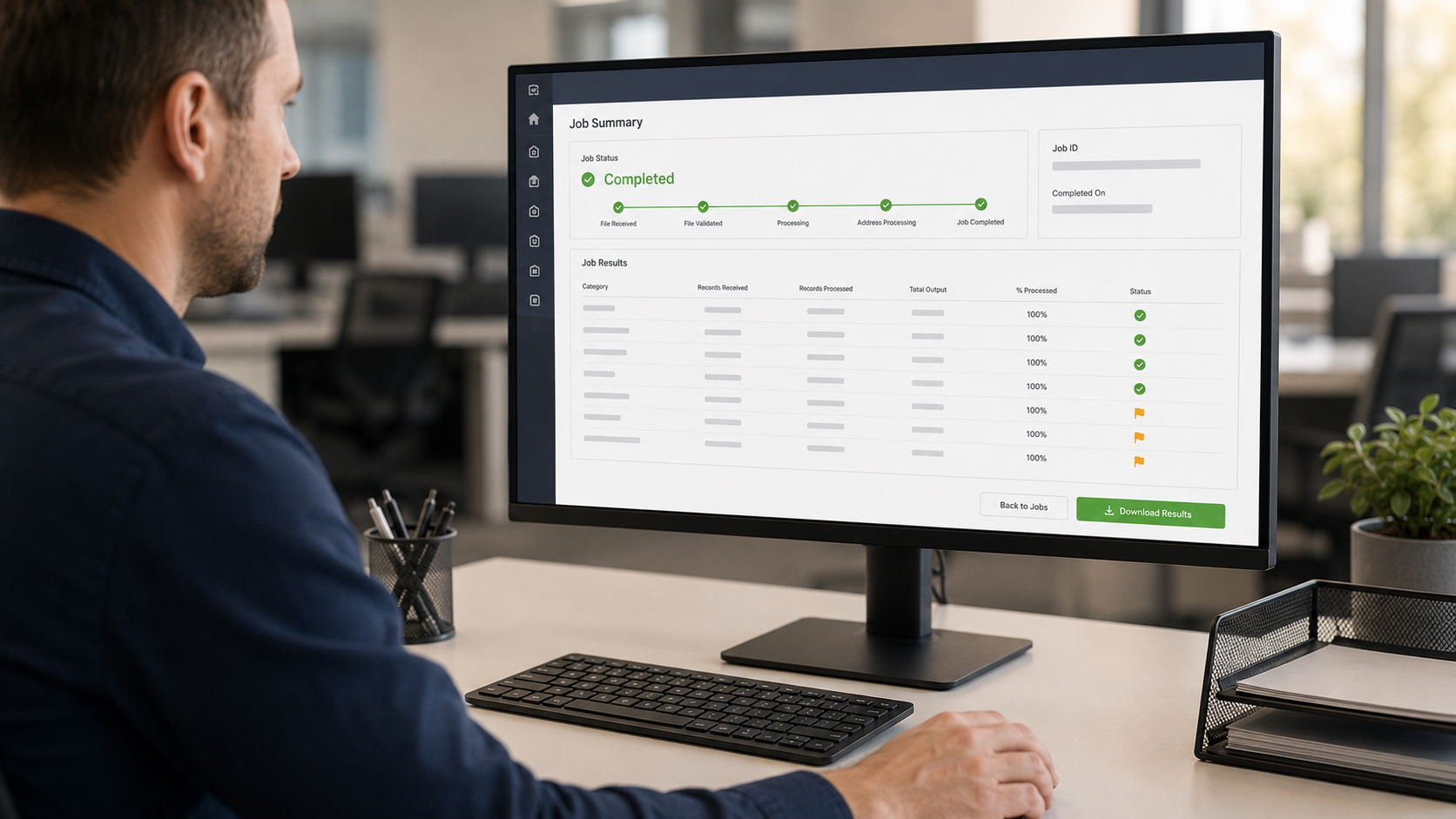 A compliance operations professional reviewing Nixie reporting data and job documentation on a desktop portal after a high-volume mailing job completes.